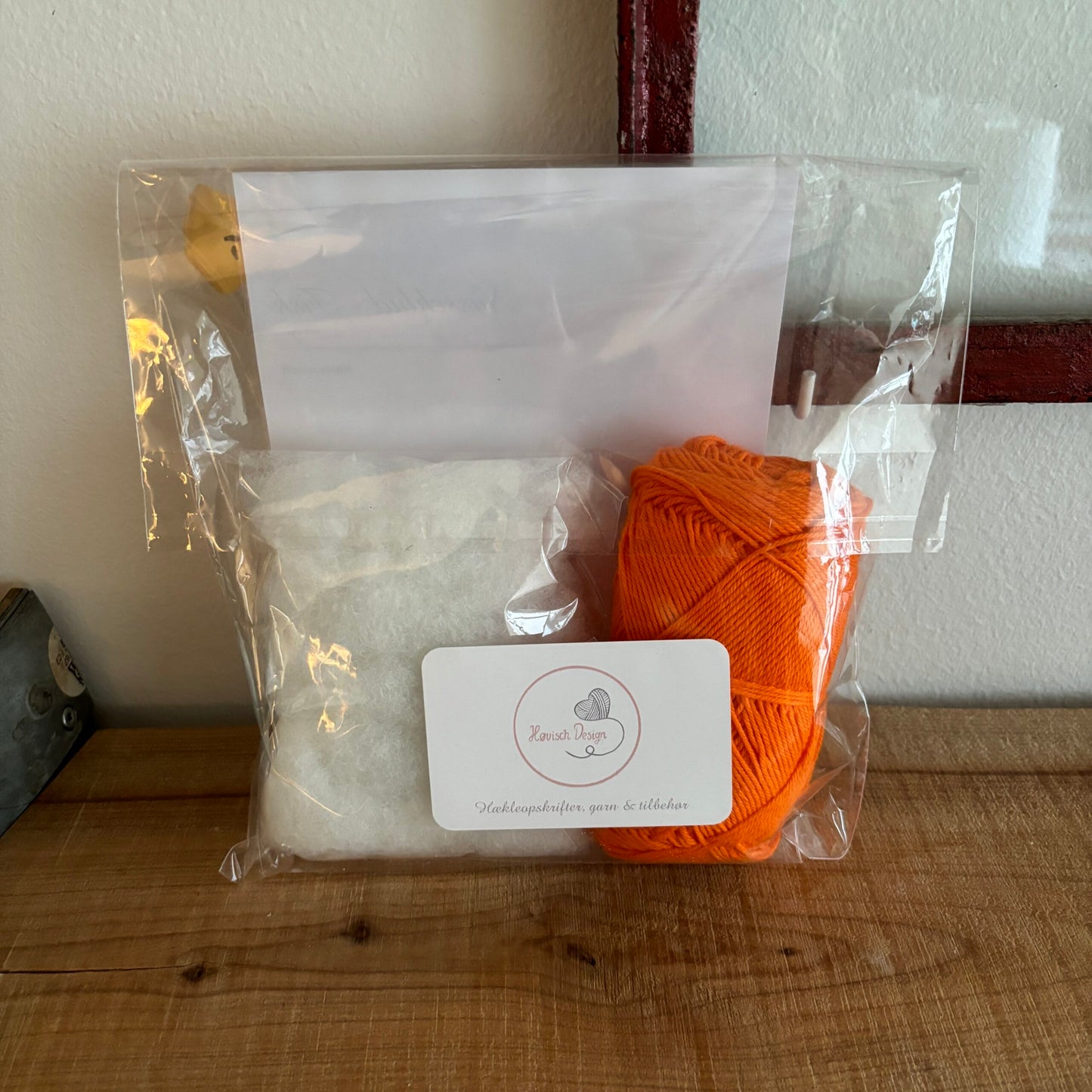 Garnpakke Nusseklud Fisk – indhold med orange garn