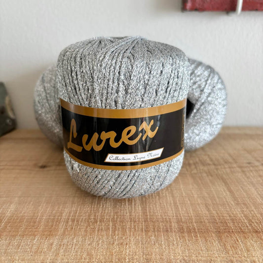 Lurex glimmergarn i sølv nr. 1, enkelt garnnøgle med etiket