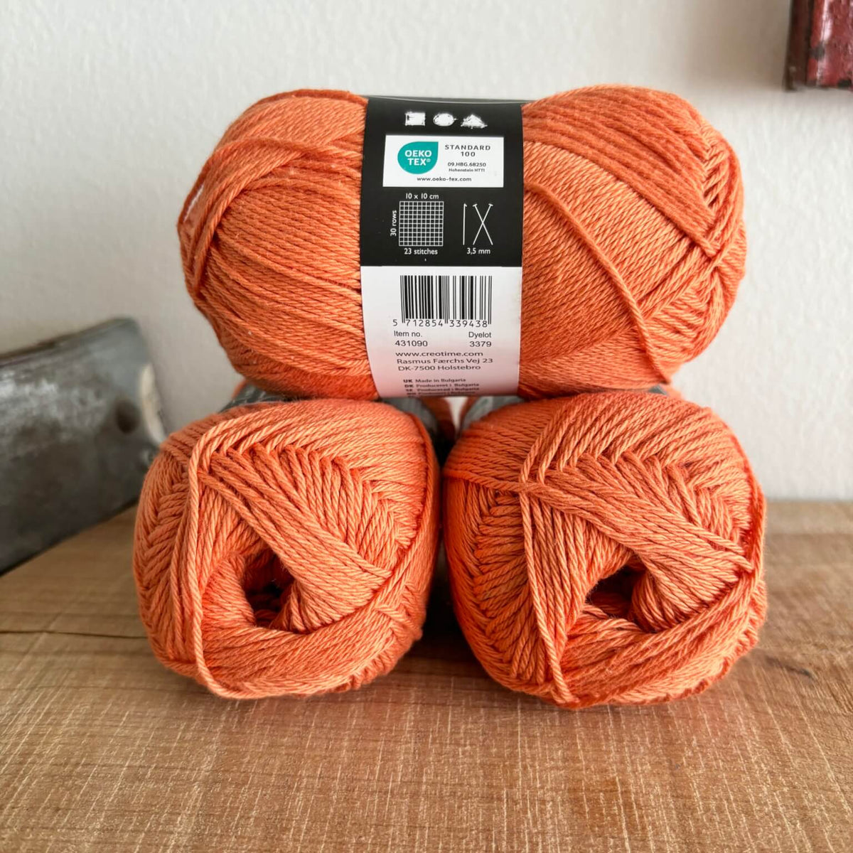 Bomuld 8/4 Oeko-Tex orange – nærbillede af etiket med varenummer 431090