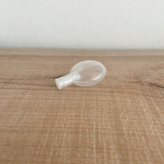 Pivert 25 mm i klar plast, liggende på siden