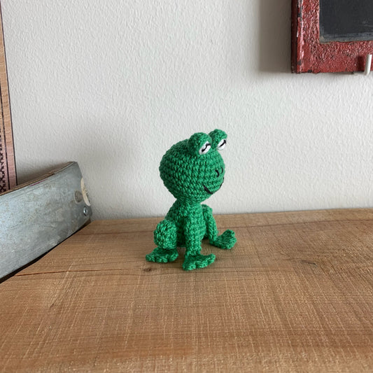 Frø-figuren set fra siden