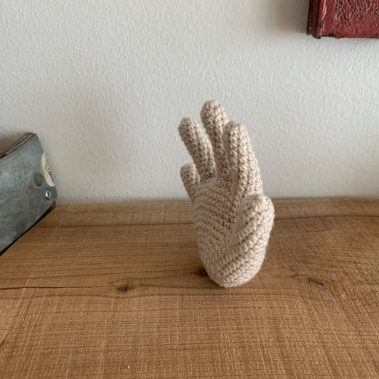 Hånd-figuren set fra siden