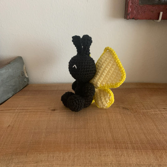 Sommerfugl-figuren set fra siden